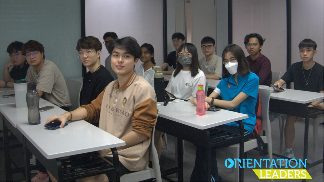 students posing while seated