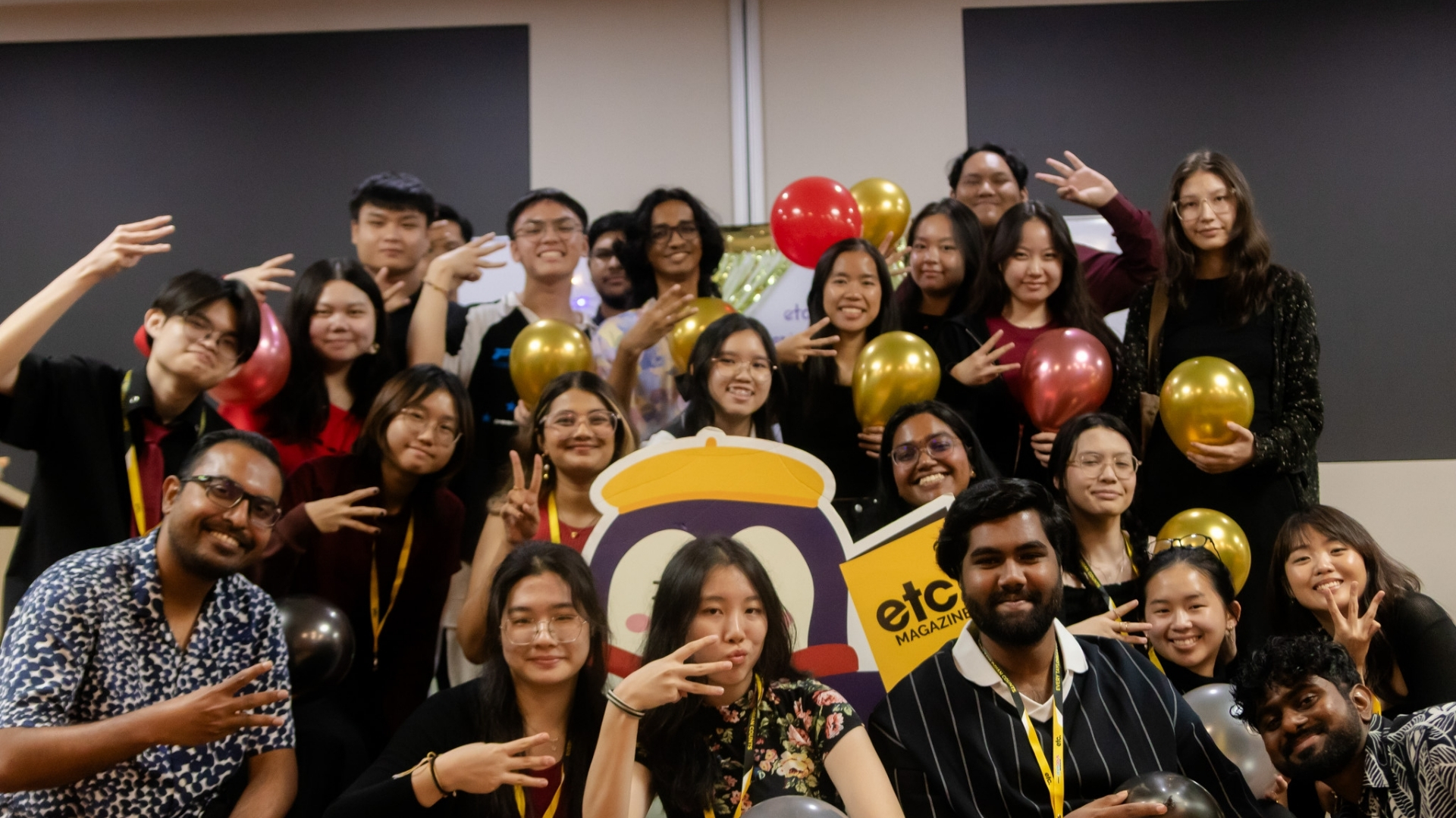 etc magazine members posing after welcoming party 
