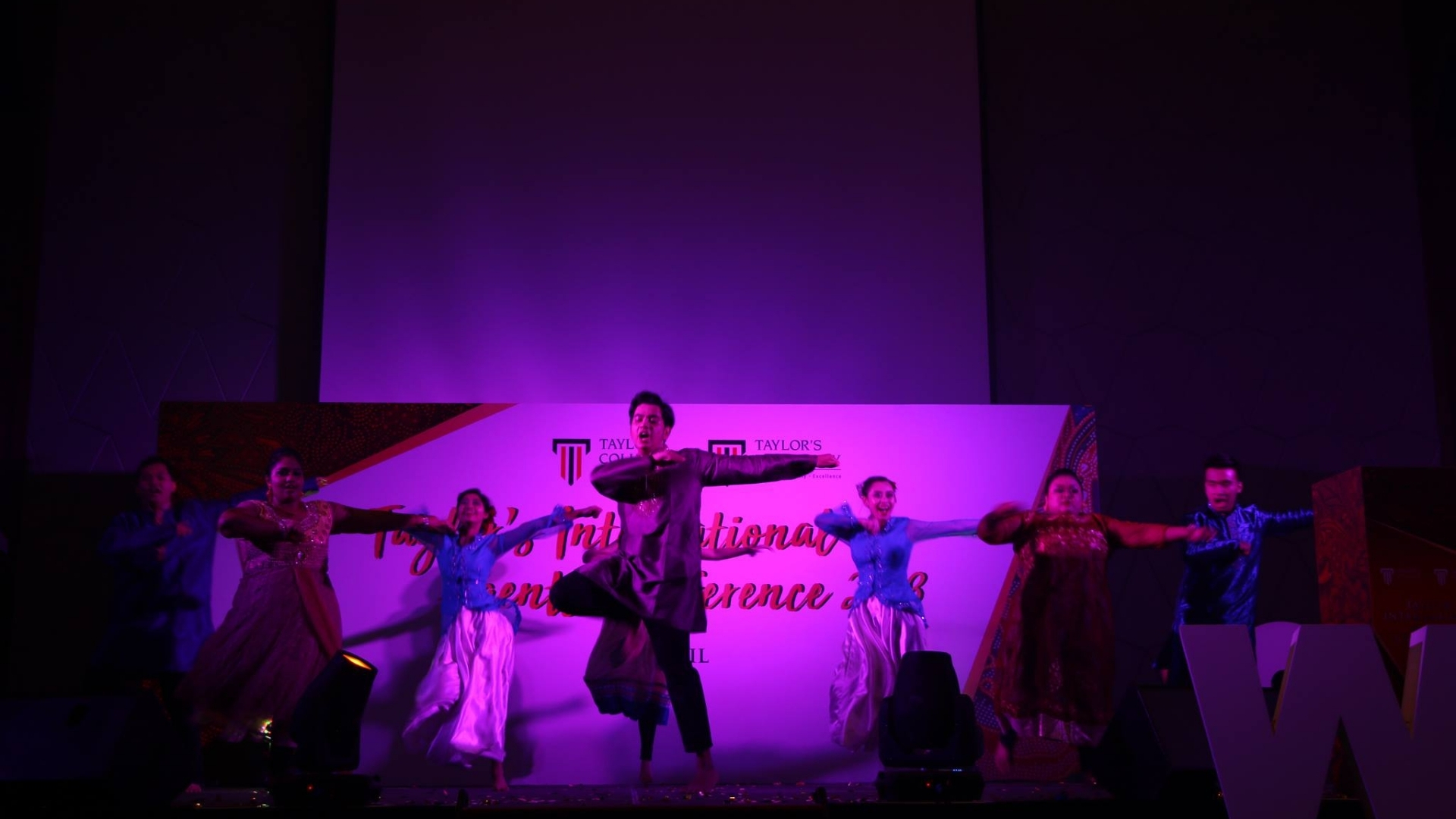 taylors students in traditional attire
