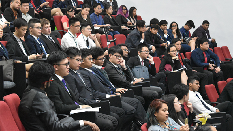 taylors tlmun students grouped in a lecture hall