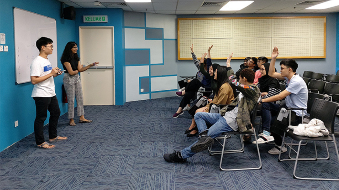 students participating in a classroom setting