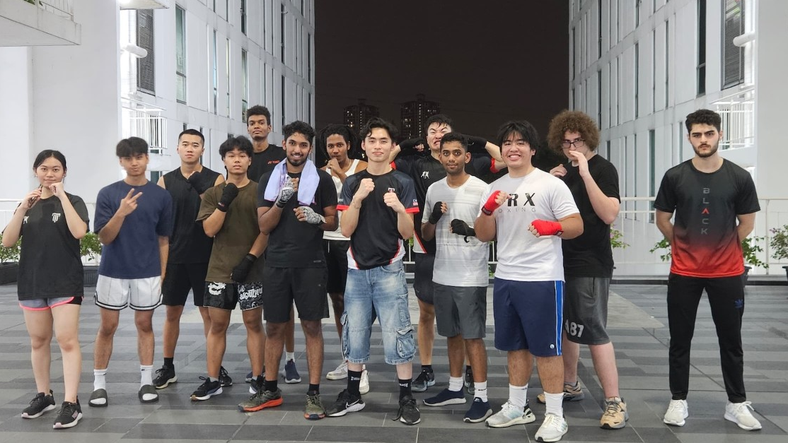 boxing team posing together