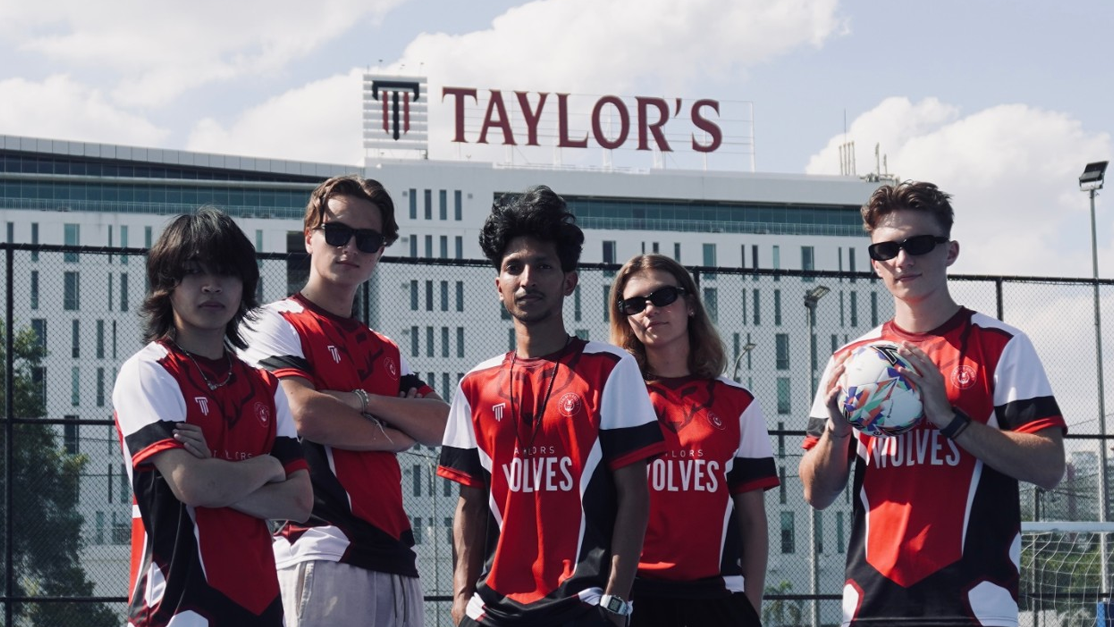 football and futsal club students pose in a field