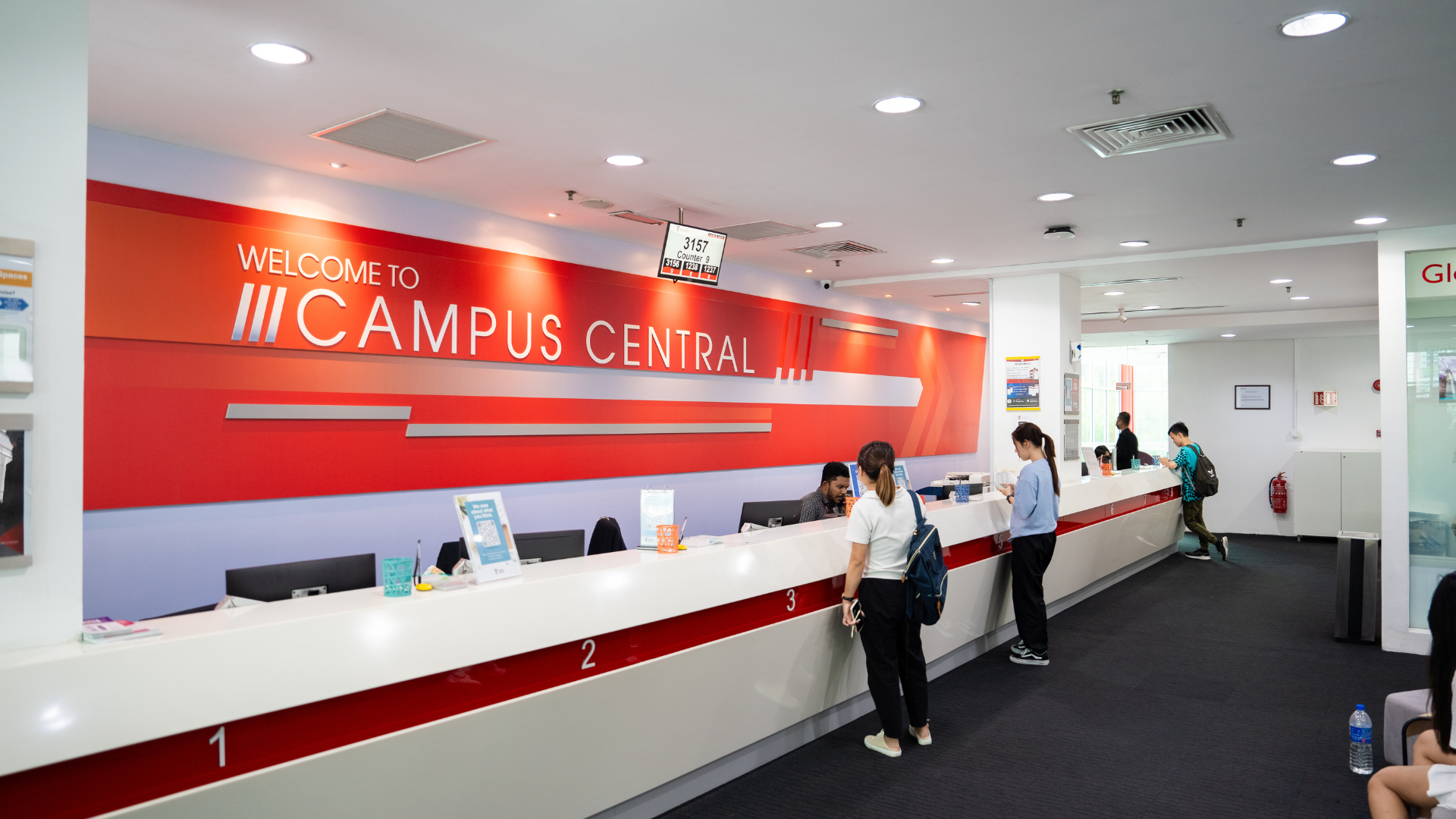 Taylor's student using a service in Campus Central.